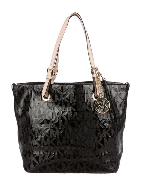 sac en toile michael kors|michael kors leather tote.